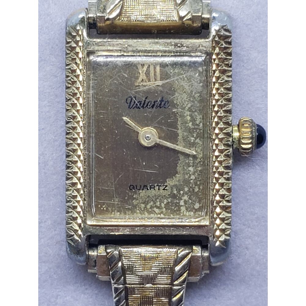 Valente women's watch. Small square gold face. Gold metal band